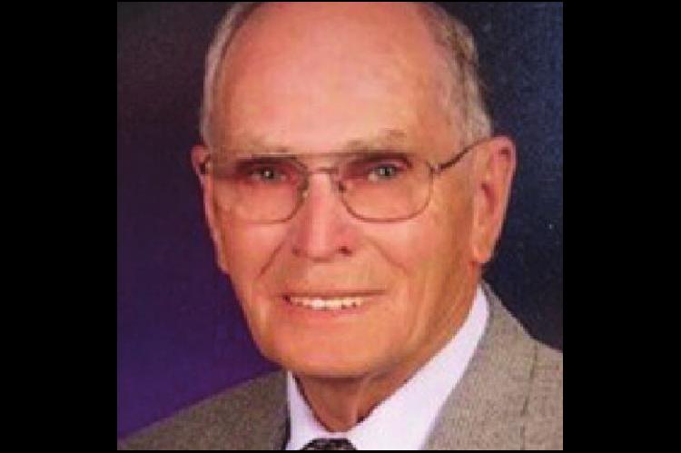Rites held for Buck Cozad