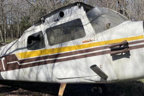 CHEMICALS, TRAVEL TRAILER, GARBAGE FOUND AT HOLDENVILLE AIRPORT