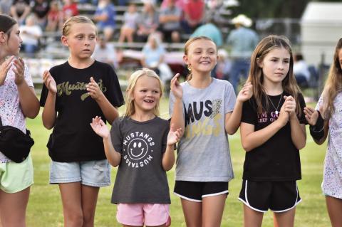 Remi Wainscott, Cambree Wainscott, Wylder Parker, Kinsey Wainscott,, Aubrey Coil and Nevaeh Frazier cheered on the Mustangs.