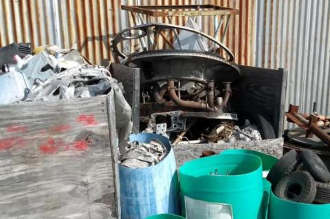 CHEMICALS, TRAVEL TRAILER, GARBAGE FOUND AT HOLDENVILLE AIRPORT