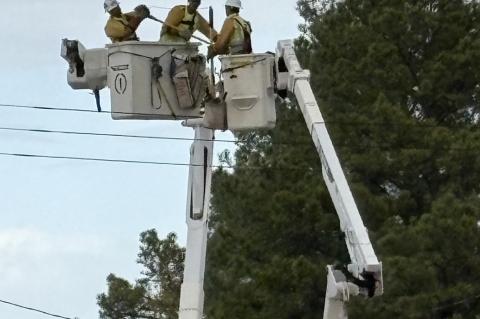 PSO linemen were out early working to restore power to Allen homes and businesses