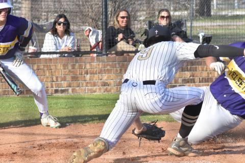 Allen Senior Mason Carter applies the tag to the Weleetka baserunner.