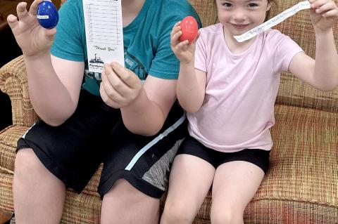 Jaxston and Boston Stewart were the lucky finders of the Scavenger Hunt egg. It was located at the Mustang Trail. They picked up their cash prize at Farmers State Bank.
