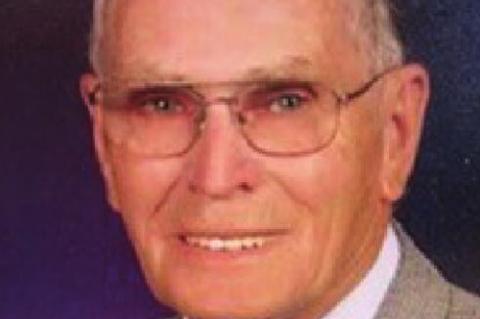 Rites held for Buck Cozad