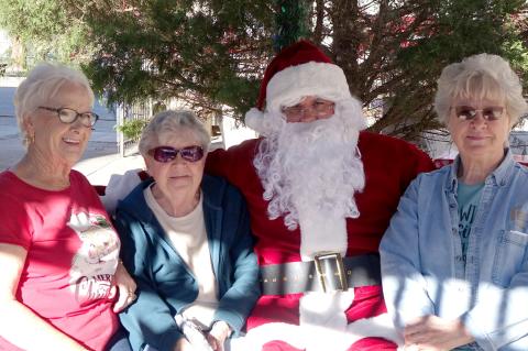 Having a good visit with Santa were Dorothy Knighten, Sandra Bottoms and Sharon Palmer.
