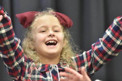 Kennedy Weger singing the grand finale of her class’ program at the Christmas program.