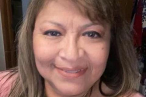 Rites held for Debra Wisdom
