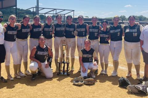 The Lady Mustangs battled back after an opening round loss to sweep the next 4 games to bring home the third place trophy Saturday. (l-r) Coach Marcus Wyatt, Kierra Frederick, Taycee Manuel, Ayla Manuel, Kayla Nickell, Addison Prentice, Cherish Woodward, 