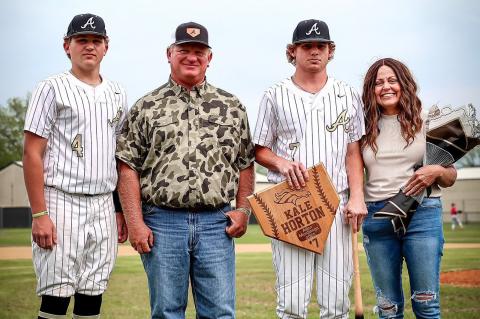 Senior Kale Horton iwith parents James and Jackie Horton and brother Brody.