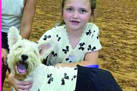 Tyler Williams and her dog RoRo won Best in Show at the Pontotoc County Fair.
