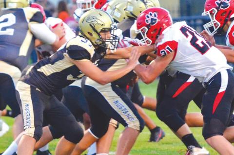 Mustangs Run Roughshod Over Bulldogs
